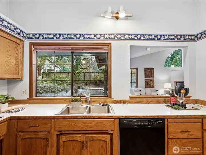 Great view into the private backyard & the living room