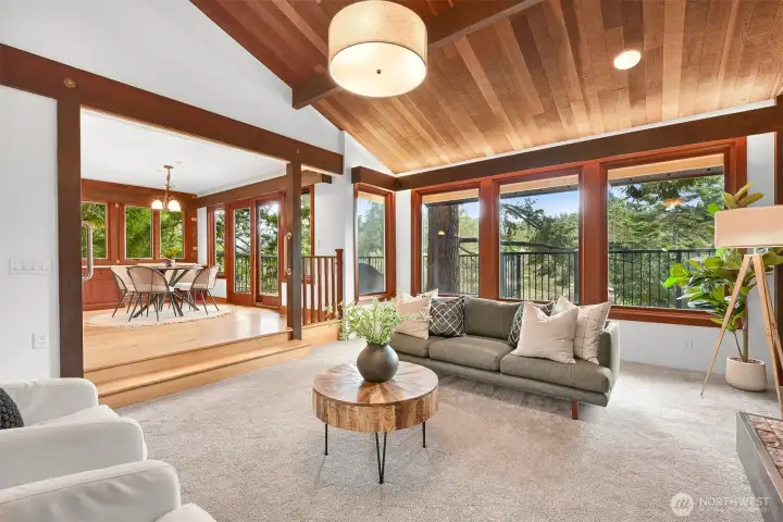 Open concept between living and dining. Look out to nature from every angle. Open concept between living and dining. Look out to nature from every angle.