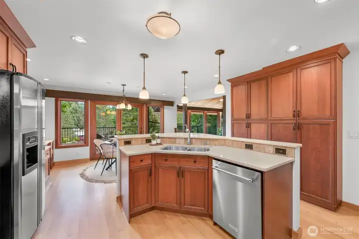 Plenty of pantry storage, and newer dishwasher, hardwoods floors and beautiful solid wood cabintry. Plenty of pantry storage, and newer dishwasher, hardwoods floors and beautiful solid wood cabintry.