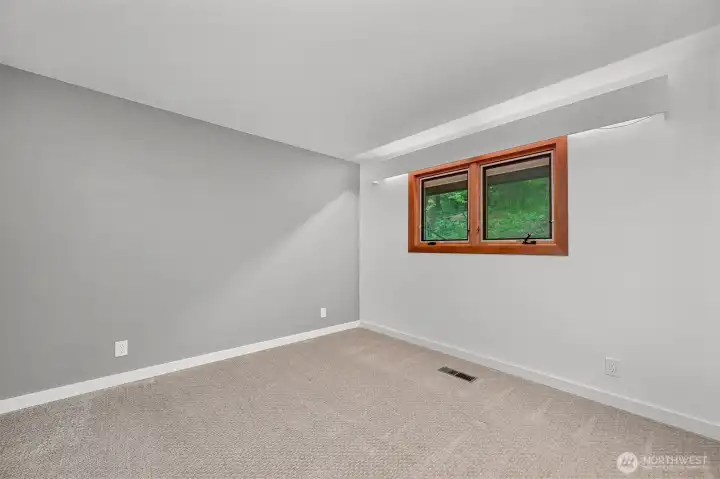 Second guest bedroom on the main level. Second guest bedroom on the main level.