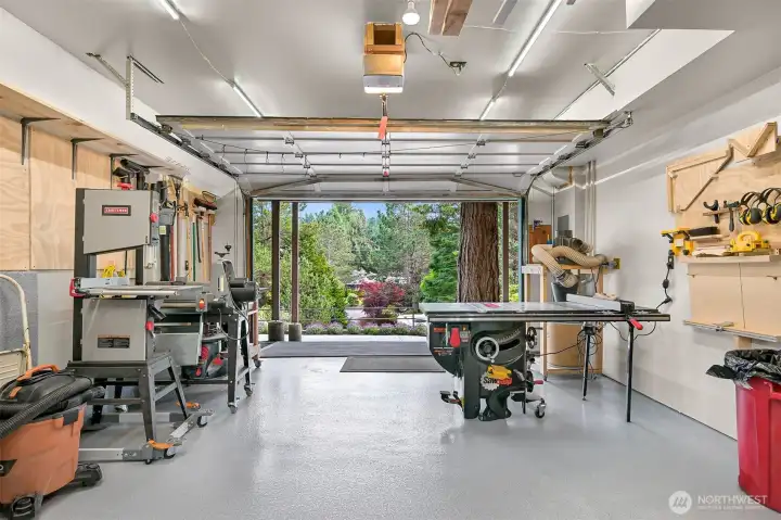 Newly remodeled garage with drywall and epoxy floors. Newly remodeled garage with drywall and epoxy floors.