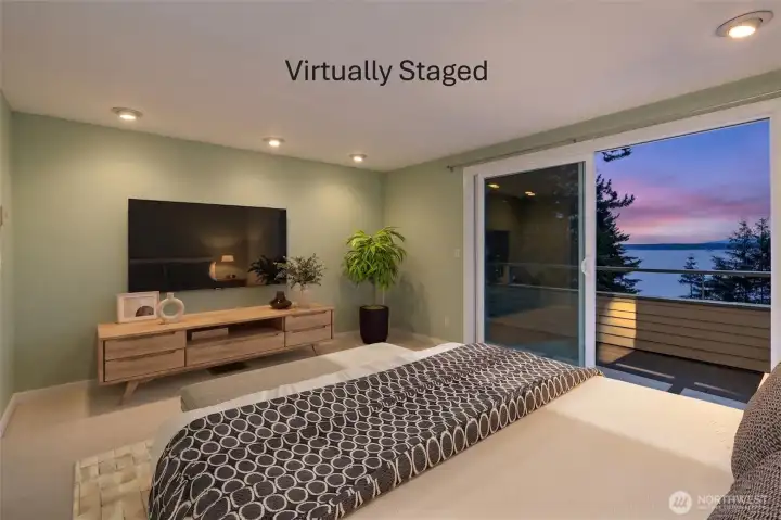 The top-floor primary suite is a true retreat, complete with a private view deck and sweeping west-facing vistas.