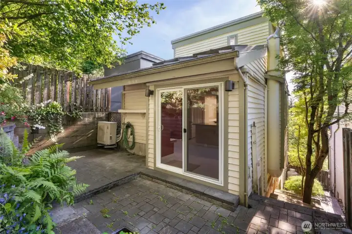 Just through the kitchen's sliding door, the private backyard unfolds as a natural extension of the living space — an effortless flow between inside and out that makes this home ideal for entertaining.