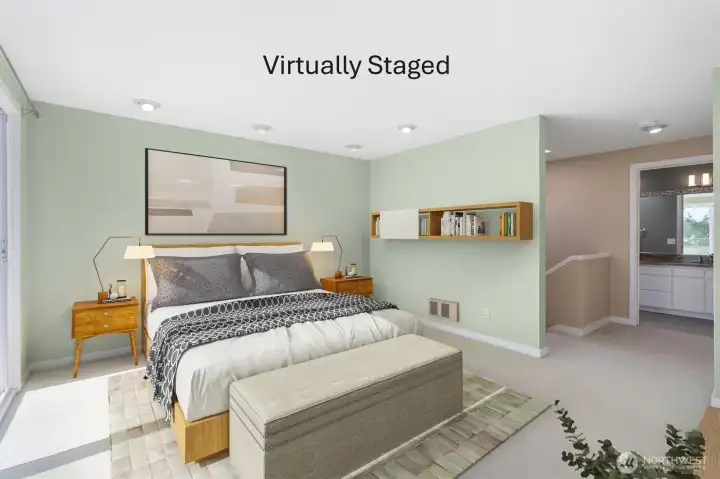 The top-floor primary suite is thoughtfully appointed, with a private view deck on one side and a full bath on the other — a serene retreat unto itself.