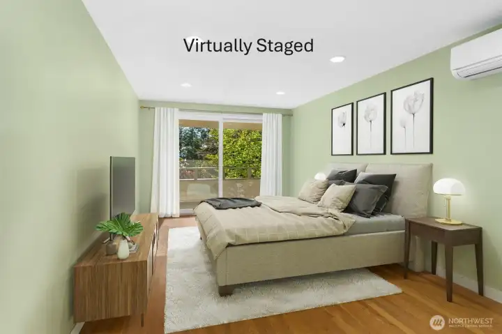 A private view deck and mini-split A/C make the guest bedroom a welcoming sanctuary — stylish, comfortable, and perfectly appointed for visitors year-round.