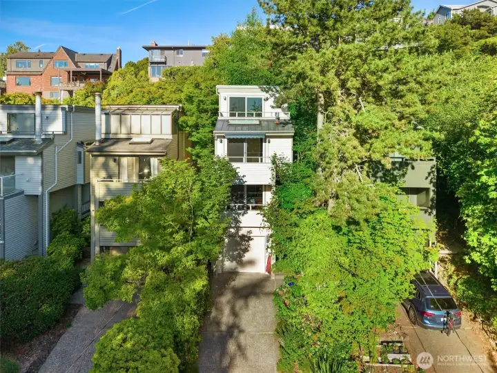 Perched high on the west-facing slope of Genesee Hill, this home places you moments from the shops, dining, and amenities of West Seattle — and just minutes from the sun, sand, and energy of Alki Beach. A location that truly has it all.