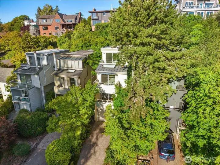 For those seeking privacy, sweeping views, and the enchanting calm of treetop living, this Genesee Hill gem is ready to welcome you home.