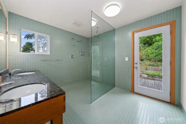 Spacious bathroom with waterfall shower Spacious bathroom with waterfall shower