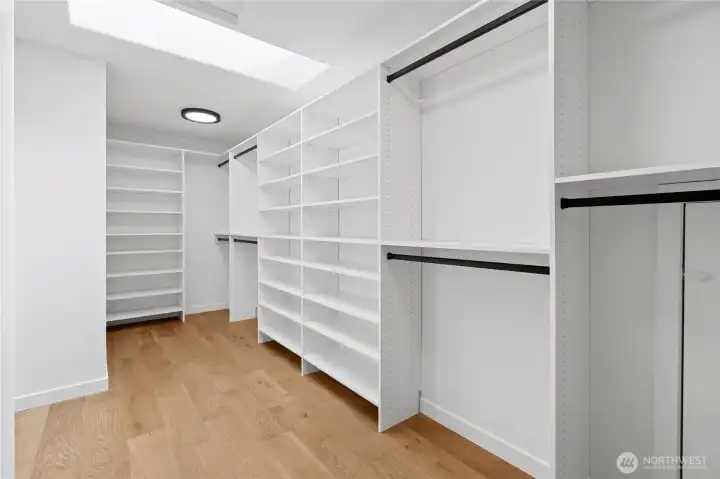 Primary walk-in closet Primary walk-in closet