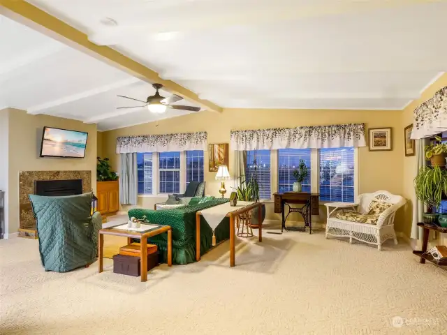 Very large living room with lots of natural light.