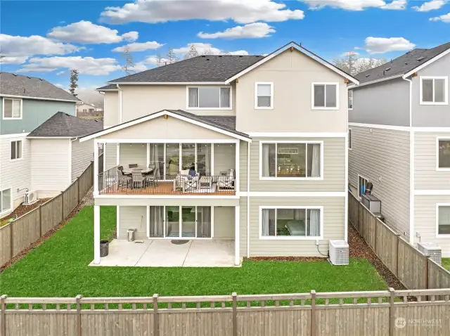 Rear exterior showing outdoor living space.  Home set high for amazing territorial views!