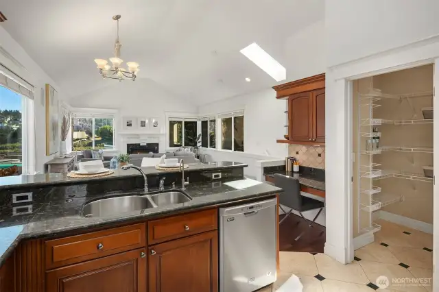 Walk-in pantry to the left of the powder room.