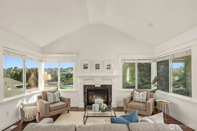 Upstairs is open living with gas fireplace, built-in speakers, etc.