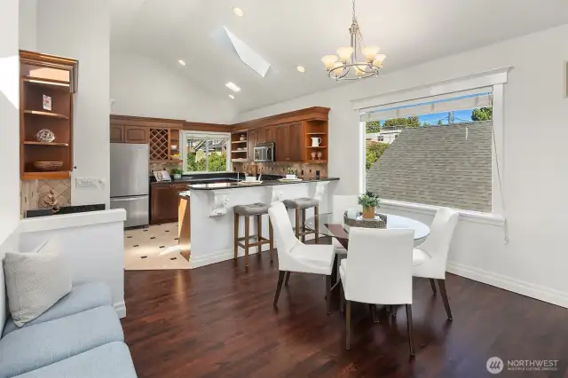 Dedicated dining area anchored by chandelier.