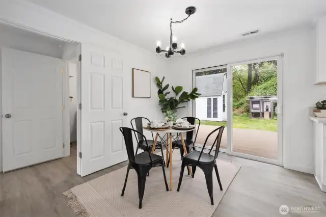 Dining Room with sliding door to the back deck and yard