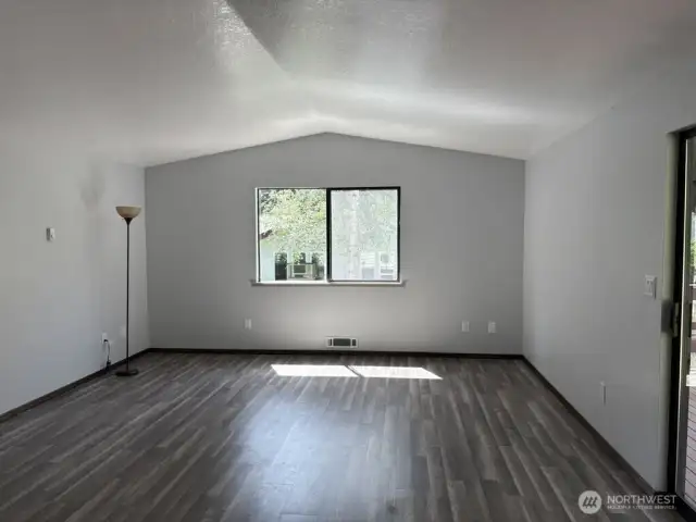 Spacious Family Room with cathedral ceiling.