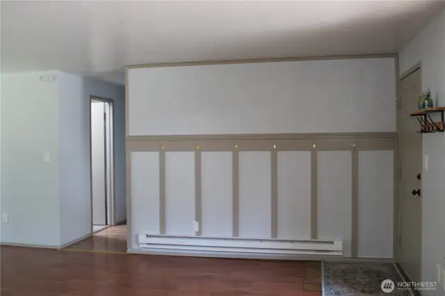 Entry wall with area to hang coats, art, etc.