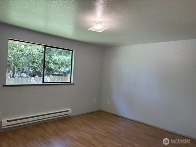 Primary Bedroom with large closet and 3/4 bath.