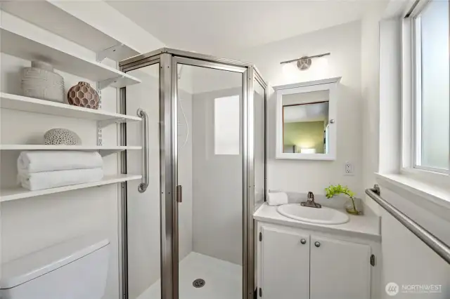 Three quarter bath in Primary bedroom. North facing privacy window.