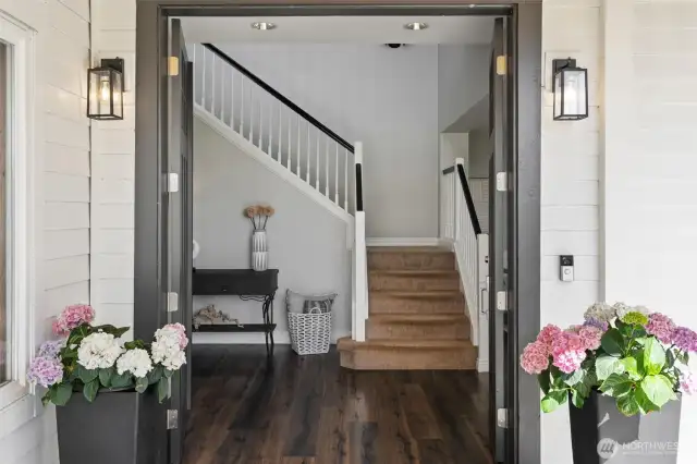 Step through double doors into a home as graceful as its garden.