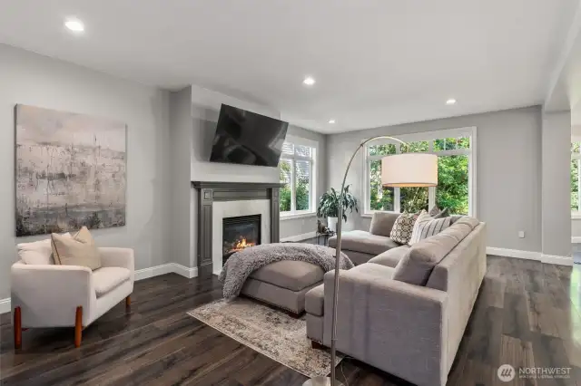 The family room centers around a cozy gas fireplace—perfect for everyday living and entertaining.