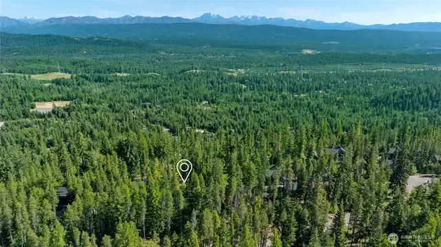 Aerial views of neighborhood and property