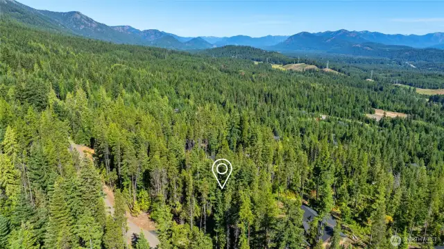 Aerial views of neighborhood and property