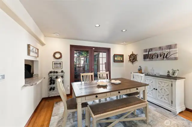 Dining with French Doors that open out to the the backyard with easy access to firepit entertaining.