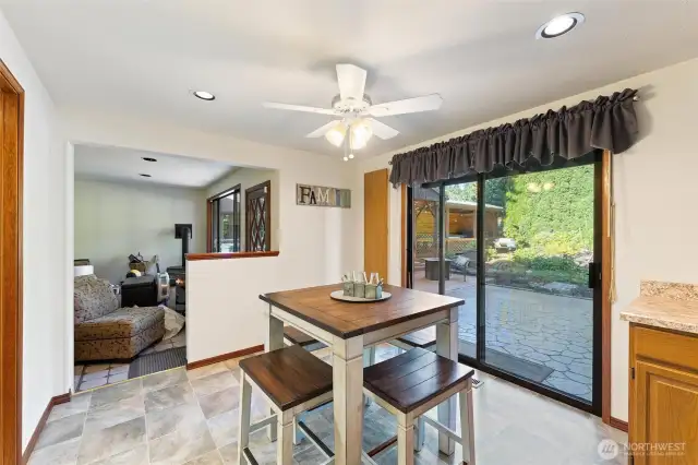 2nd dining space and flexible room. Great oppurtunity for a guest room by completing the wall and completing wall and adding a door. Separate entrance, gas fireplace, bathroom with shower downstairs. Multigenerational living opportunity? Room rental?