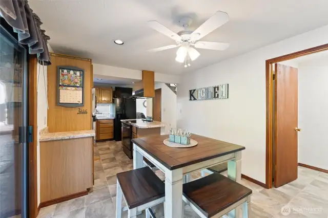 New flooring in the kitchen, Original hardwoods under the carpet.