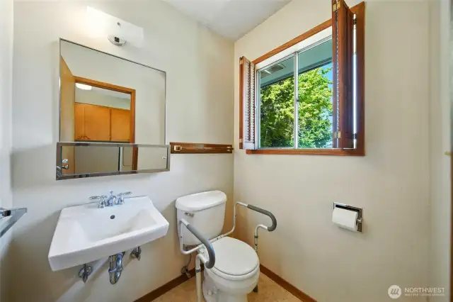 1/2 Bath Conveniently Located Off Utility Room