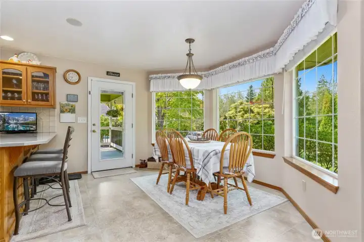 dining area with door to the back patio