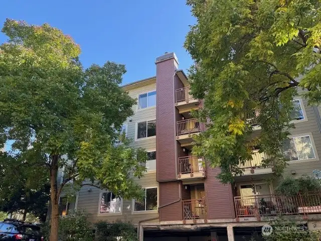 Unit 311 is in the northeast corner with windows on both sides.