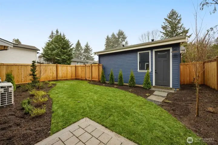 Fully landscaped and fenced rear yard.
