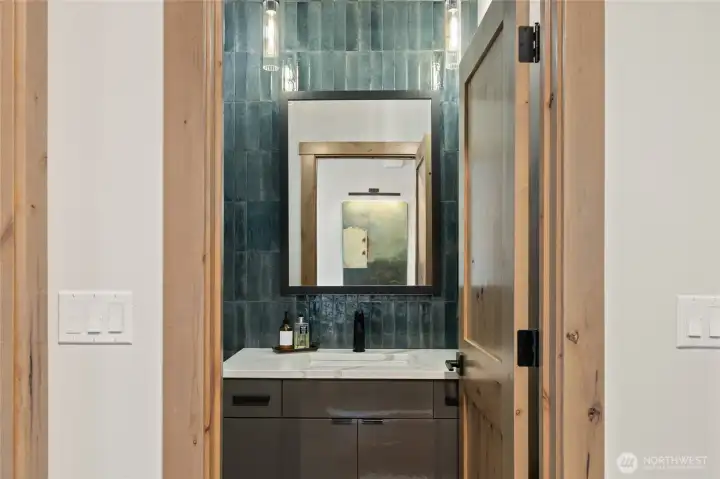 Powder bathroom off of entry