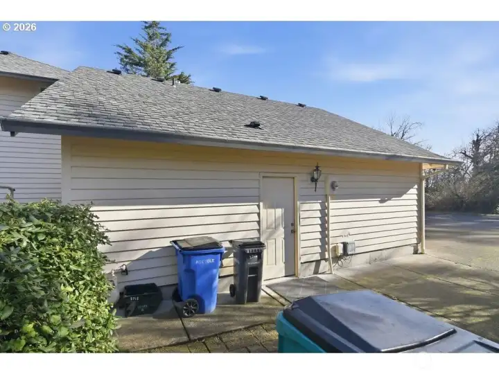 Garage side door and RV parking.