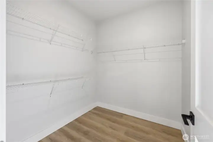Primary walk in closet.