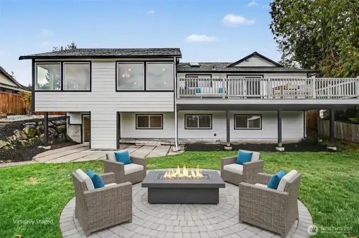 Virtually staged, added stone pad and furniture to show the potential.