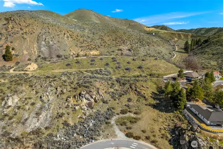 Convenient access from Crest Drive leads to multiple potential building sites on this Lake Chelan lot.