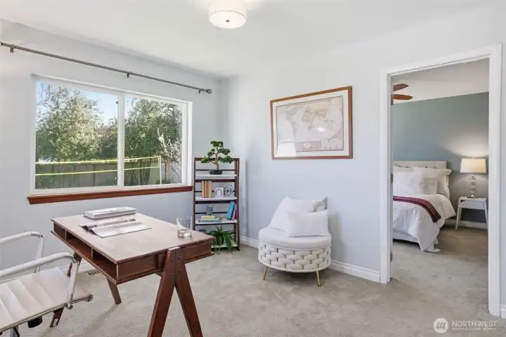 Seller used this room as a tv/media room. Fiber internet, coax cable and the dining/living room hard wired speaker receiver would go here as well.