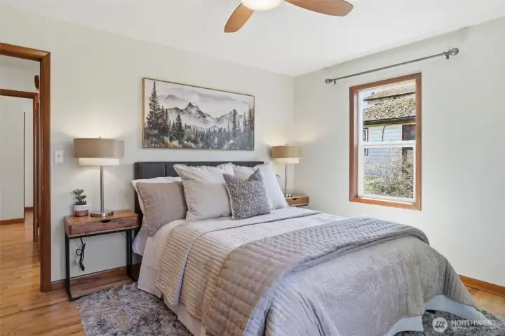 Large primary bedroom with South and West facing windows.