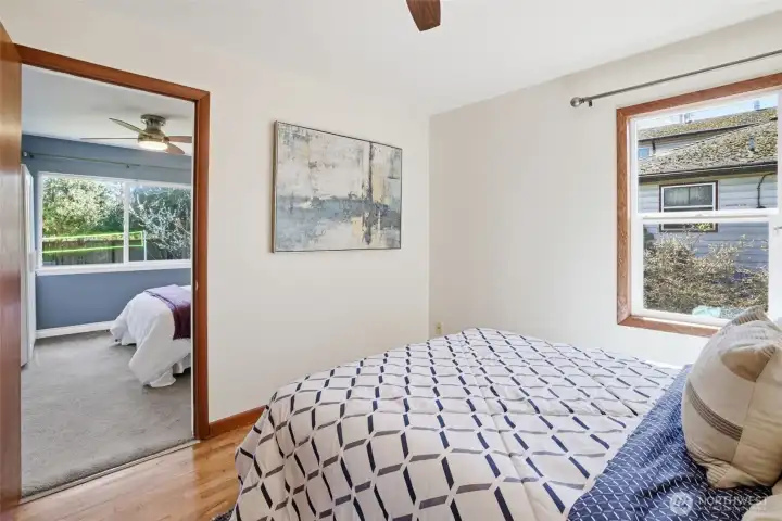 2nd bedroom with South facing window and access to the third bedroom.