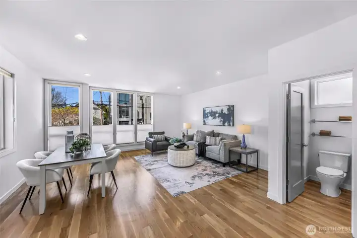 Main level family room with powder room to the right.
