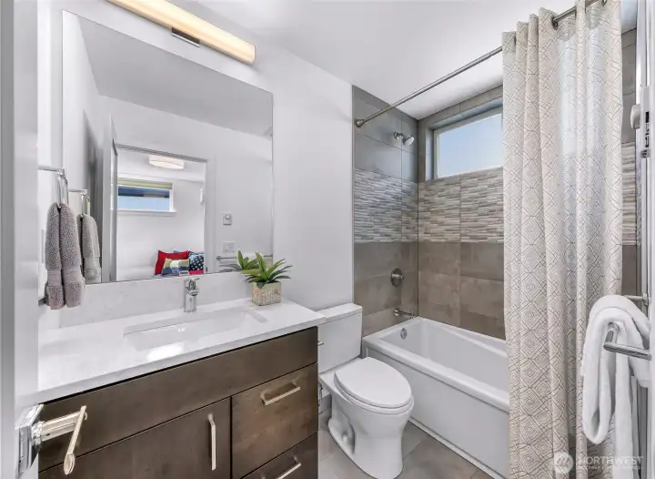 Full bath attached to 3rd bedroom.