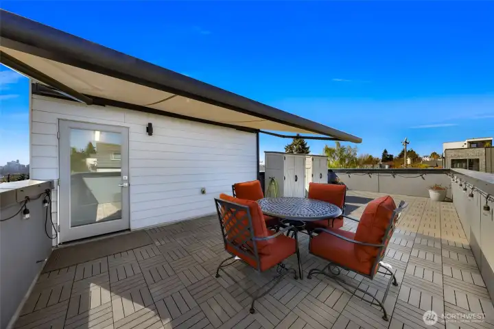 Retractable awning with remote control for easy use.