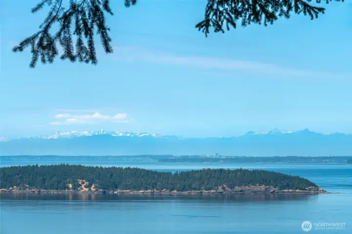 Expansive views toward Matia Island, White Rock, B.C., and the Canadian Cascades.