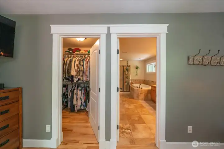 There are two closets in the primary bedroom, this picture shows the one next to the entry to the private bathroom.