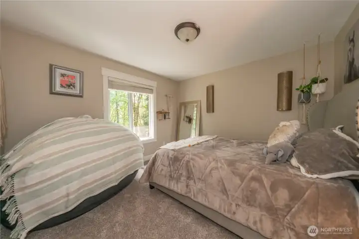 Main floor bedroom with walk in closet