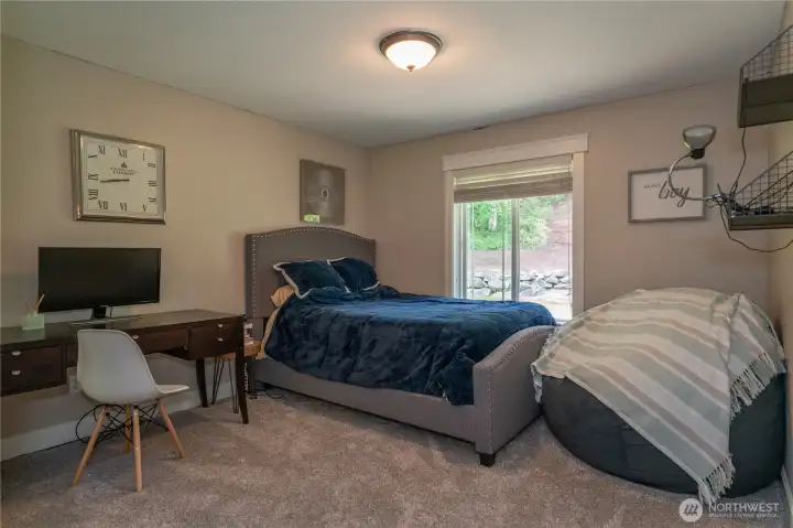 This main floor bedroom as a closet with two sliding doors