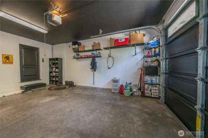 The three car garage has been been recently painted.